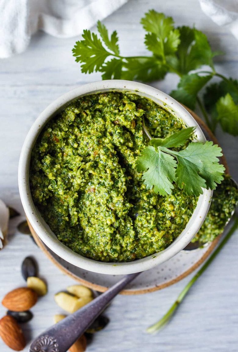 Fresh and lively, Cilantro Pesto is full of zippy flavor and totally adaptable!   Toss with pasta, spread on bread, or serve with soups, grilled salmon, beans and eggs.  Vegan-adaptable, healthy and easy to make!