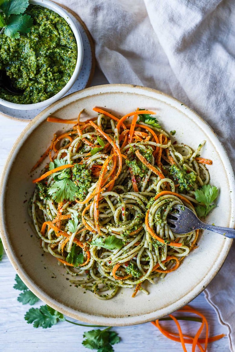 Fresh and lively, Cilantro Pesto is full of zippy flavor and totally adaptable!   Toss with pasta, spread on bread, or serve with soups, grilled salmon, beans and eggs.  Vegan-adaptable, healthy and easy to make!