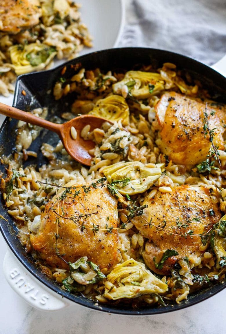 One Skillet Creamy Orzo Chicken with Artichoke Hearts- a deliciously cozy dinner, made with simple pantry ingredients, perfect for busy weeknights. 