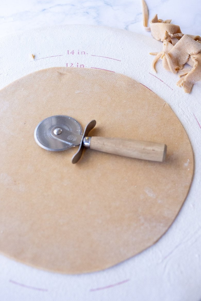 rolling out the quiche crust dough