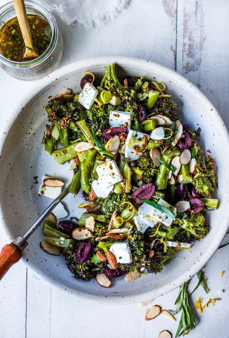 Easy Roasted Broccoli Salad with toasted almonds, kalamata olives, and lemon zest, drizzled with delicious Mustard Seed Maple Dressing.  Amazingly simple, yet filled with so much vibrant flavor. 