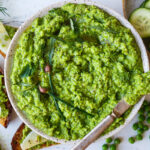Quick and easy to make, this Spring Pea Pesto is deliciously vibrant with fresh herby flavor. Perfect for a dip, spread or use as a sauce with pasta and buddha bowls. Vegan and gluten free!