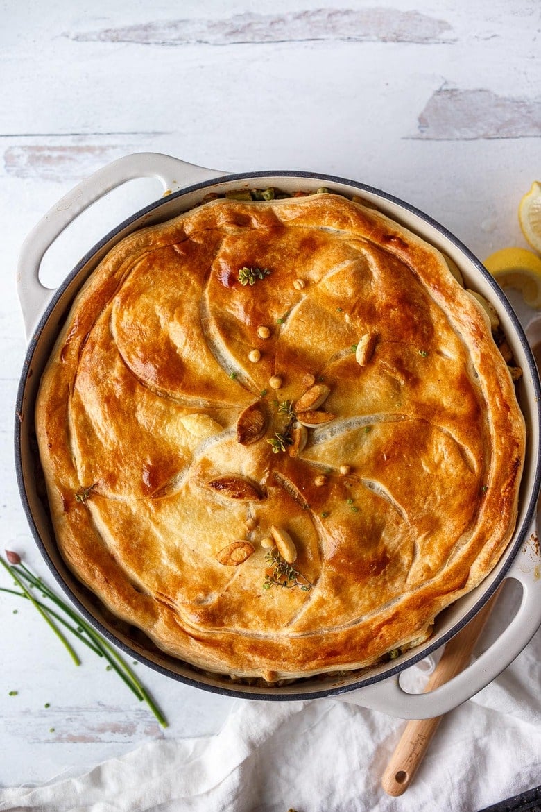 Vegan Pot Pie with Spring Vegetables is loaded with vibrant fresh veggies and flavorful herbs cooked in a delicious creamy lemon mustard sauce and topped with a flakey puff pastry crust.  