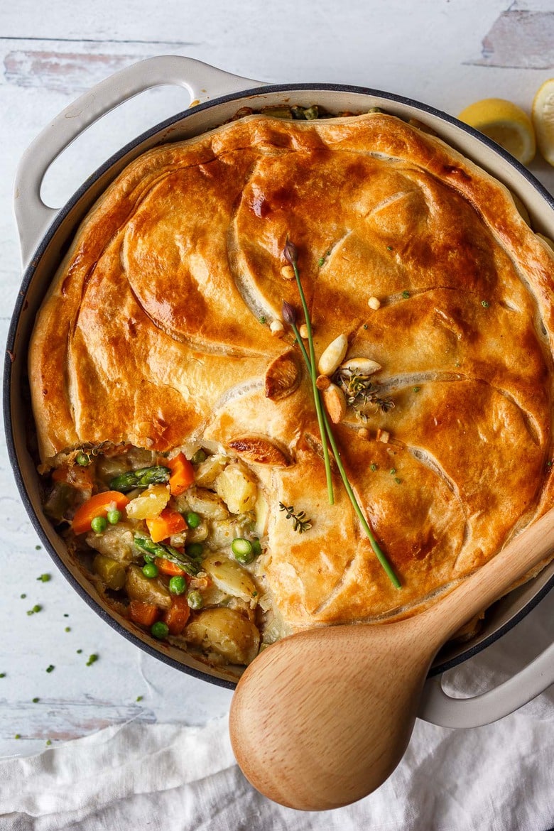 Vegan Pot Pie with Spring Vegetables is loaded with vibrant fresh veggies and flavorful herbs cooked in a delicious creamy lemon mustard sauce and topped with a flakey puff pastry crust.  