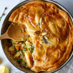 This Vegan Pot Pie is loaded with vibrant fresh spring veggies and flavorful herbs cooked in a creamy lemon mustard sauce topped with a flakey puff pastry crust.