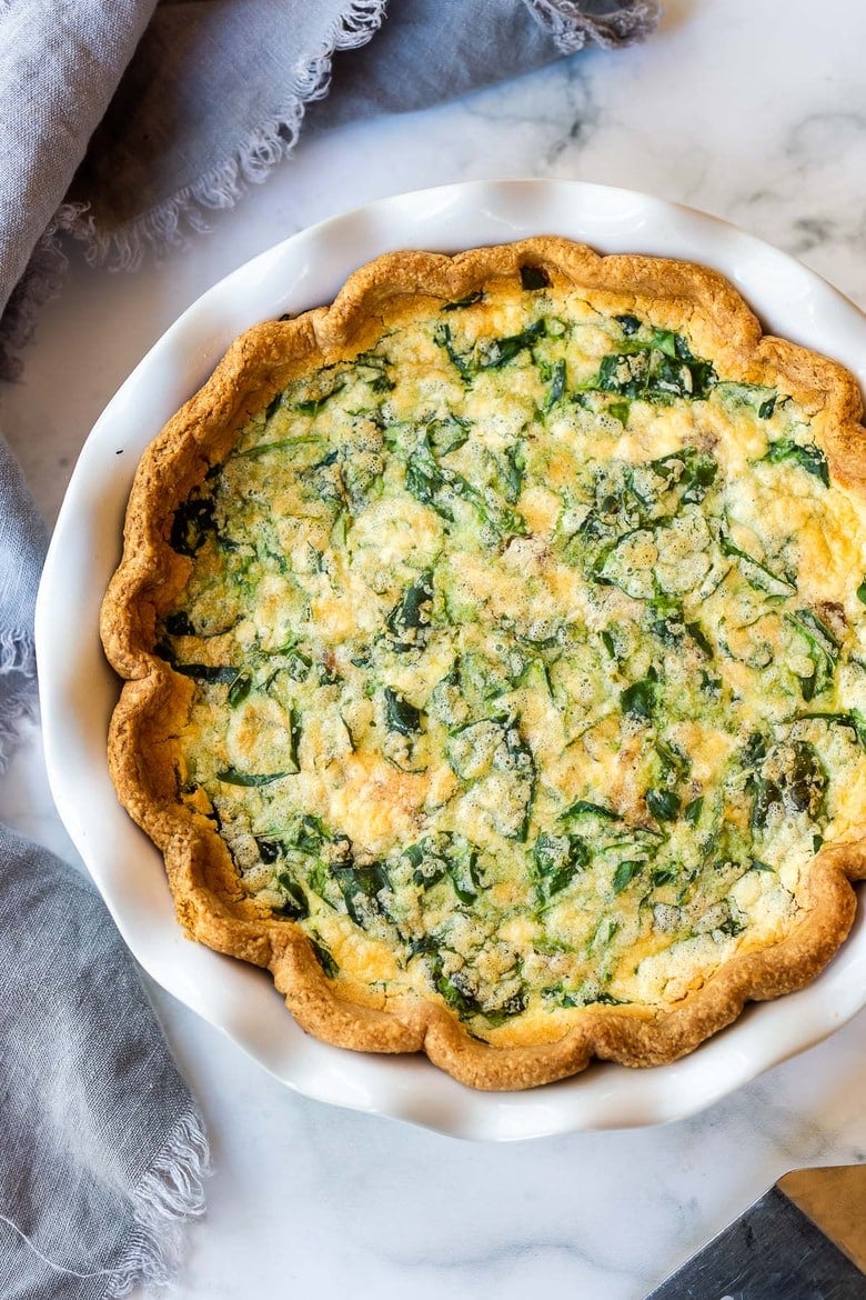 Learn the secret to making the perfect quiche every time! This Quiche Recipe features a buttery, flakey crust filled with a silky-smooth, creamy custard and your choice of veggies or greens. 