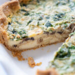 Learn the secret to making the perfect quiche every time! This Quiche Recipe features a buttery, flakey crust filled with a silky-smooth, creamy custard and your choice of veggies or greens. 