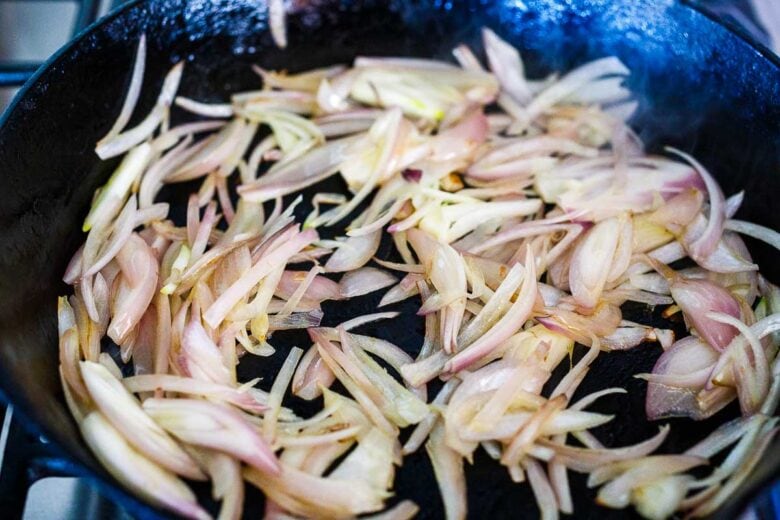 Sautéing shallots for Thai basil chicken.