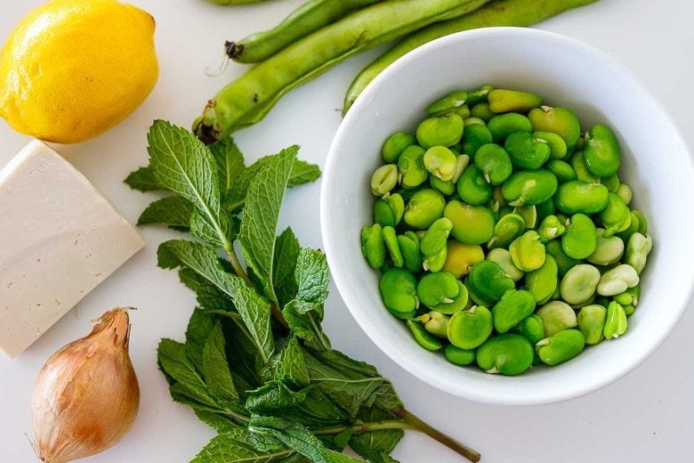 fava beans, lemon, mint, shallot on the counter