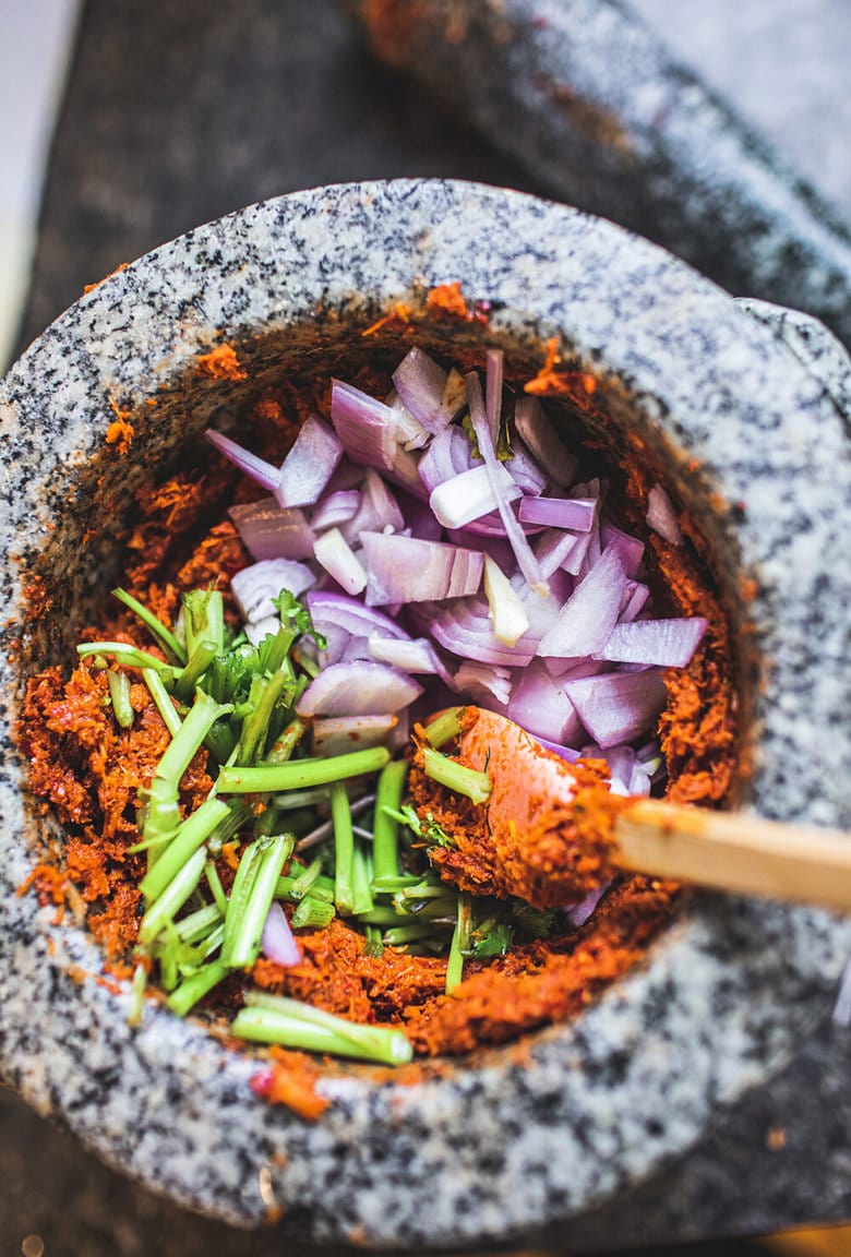 Making authentic Thai Red Curry Paste from scratch is fast and easy and can be made in under 30 minutes. Make it in a food processor or use a mortar and pestle for a more authentic approach -both yield incredible flavors and aromas that will give your Thai dishes delicious flavor. Vegan-adaptable!