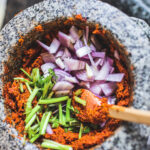 Making authentic Thai Red Curry Paste from scratch is fast and easy and can be made in under 30 minutes. Make it in a food processor or use a mortar and pestle for a more authentic approach -both yield incredible flavors and aromas that will give your Thai dishes delicious flavor. Vegan-adaptable!