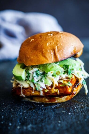 Crispy BBQ Tofu Sandwich topped with cool and creamy cilantro cabbage slaw, that can be made in under 30 minutes - plus it is vegan.
