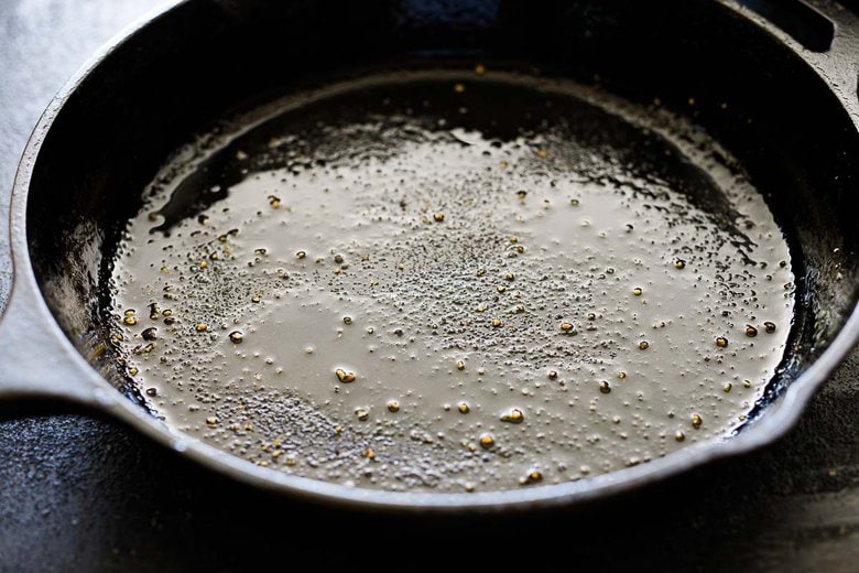 a seasoned skillet -with oil, salt and pepper