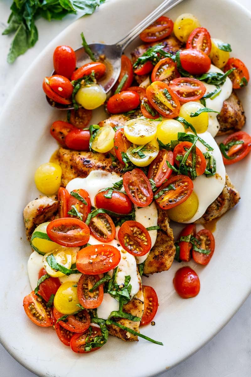 This recipe for Chicken Caprese is easy to make, with simple ingredients. It's bursting with summertime flavor and can be made in 30 minutes! Perfect for alfresco dining or outdoor gatherings. 