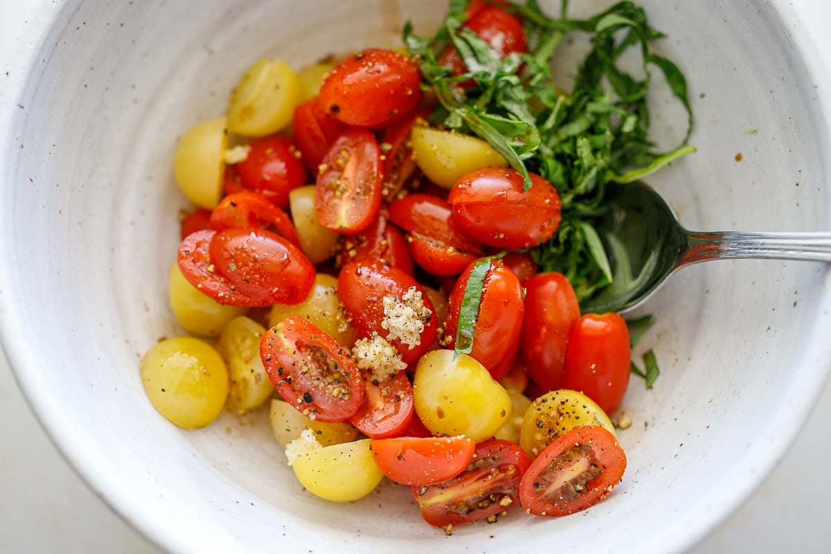 tomato salad ingredients in a bowl