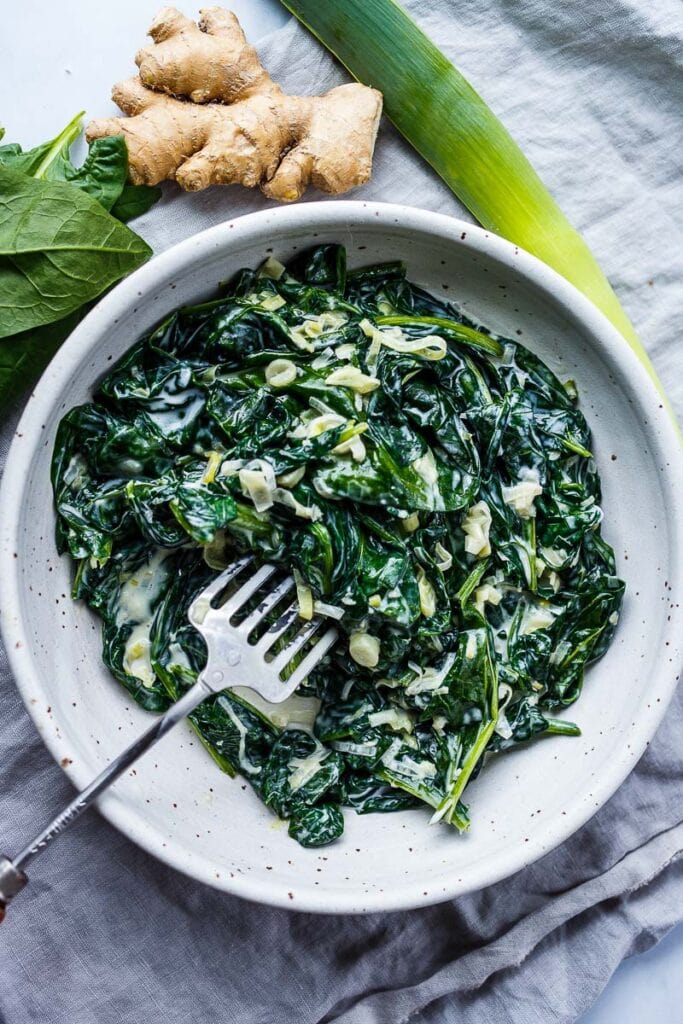 Rich and luscious Coconut Creamed Spinach has a silky melt-in-your-mouth texture. Simple to put together and makes an easy delicious side dish.  Vegan and Gluten-Free!