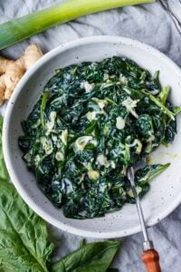 Rich and luscious Coconut Creamed Spinach has a silky melt-in-your-mouth texture. Simple to put together and makes an easy delicious side dish.  Vegan and Gluten-Free!