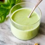 Creamy Cashew Basil Dressing - tangy, creamy, vegan and full of summer flavor. Use on crispy-crunchy lettuces like romaine and little gems and perfect with summer tomatoes.