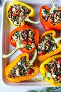 Filled with flavor, protein and fresh ingredients these Mediterranean Stuffed Peppers are completely adaptable, easy to make and can be prepared ahead for a healthy weeknight dinner.  