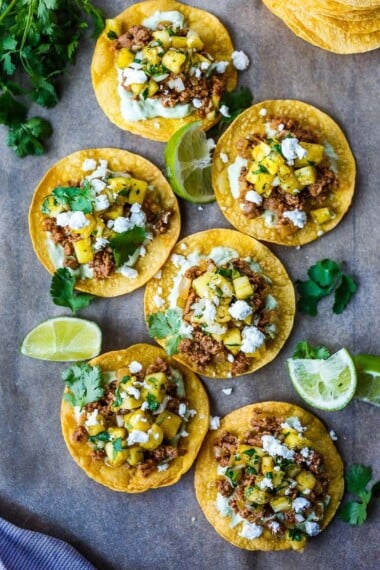 Chipotle Tostadas are crunchy, fresh and easy to make.  A crispy homemade tostada shell piled with savory ground turkey (or meat of your choice!), avocado cream and fresh pineapple salsa.  So good and so easy!