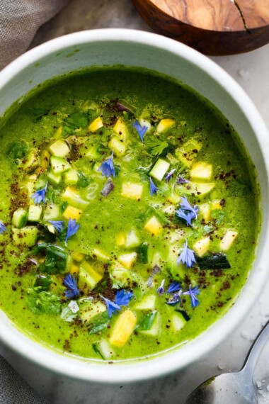 Here's a refreshing recipe for Green Gazpacho - a chilled raw soup, made with fresh garden ingredients that can be made in 15 minutes. A nourishing and delicious summer treat! 