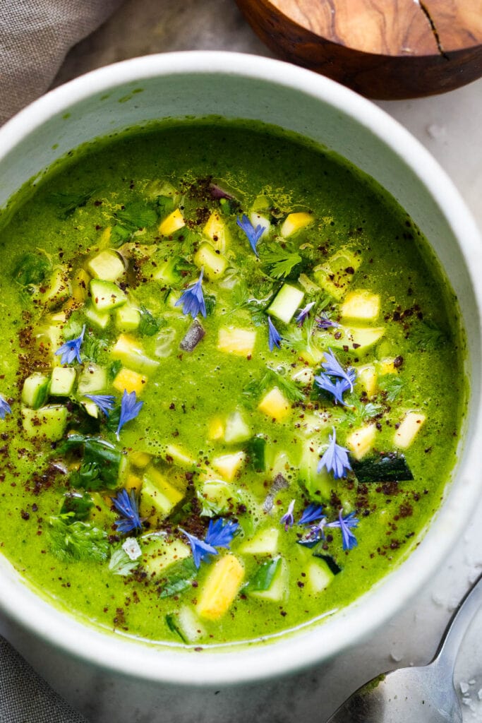 Here's a refreshing recipe for Green Gazpacho - a chilled raw soup, made with fresh garden ingredients that can be made in 15 minutes. A nourishing and delicious summer treat! Allow 30-60 minutes to chill.