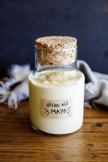 This simple, easy mayonnaise recipe is made with olive oil and can be made in a blender, food processor,  whisked by hand, or use an immersion blender. Keep it in the fridge for up to 3 weeks!