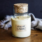 This simple, easy mayonnaise recipe is made with olive oil and can be made in a blender, food processor, whisked by hand, or use an immersion blender. Keep it in the fridge for up to 3 weeks!