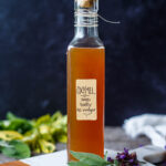 Made with just 3 ingredients, this Sage Oxymel is an easy home remedy full of antimicrobial and antioxidant properties. Perfect to make when sage is in abundance and a lifesaver to have on hand to heal and soothe sore throats, coughs, and colds. A simple, clean recipe made with common ingredients.