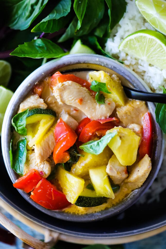 Thai Pineapple Curry is a quick and easy meal to whip up.   This delicious, 20-minute version is full of healthy vegetables,  fresh pineapple, and your choice of Chicken, Shrimp or Tofu, and bathed in the most fragrant coconut red curry sauce. Vegan-adaptable. 