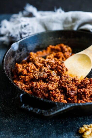 Smoky, savory, spicy Vegan Chorizo made with walnuts and lentils and Mexican Spices- a tasty plant-based alternative to chorizo to use in tacos, tostadas, quesadillas, burritos, burrito bowls, nachos or breakfast bowls. Make it ahead and keep it in the fridge for busy weeknights! 