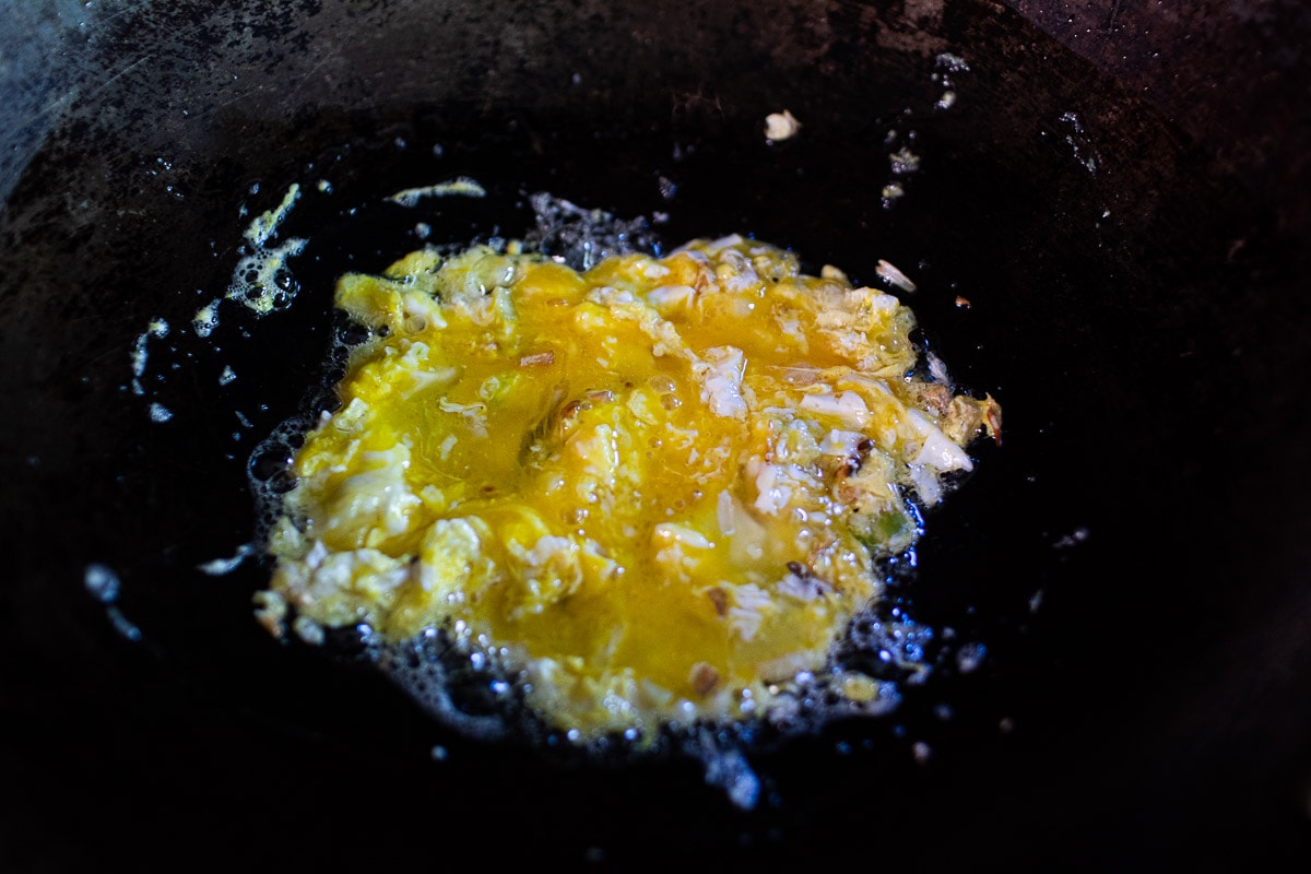 scrambled eggs in a wok