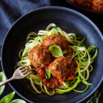 These flavorful Italian Meatballs are chock full of fresh herbs and savory goodness.  Fast and easy they can be made in 30 minutes. Serve them with zucchini noodles, roasted spaghetti squash, pasta, creamy polenta or in a roll. Low-carb, keto and gluten-free.