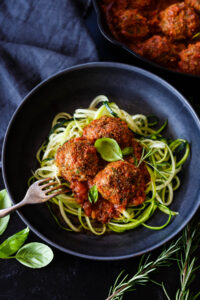 These flavorful Italian Meatballs are chock full of fresh herbs and savory goodness.  Fast and easy they can be made in 30 minutes. Serve them with zucchini noodles, roasted spaghetti squash, pasta, creamy polenta or in a roll. Low-carb, keto and gluten-free.