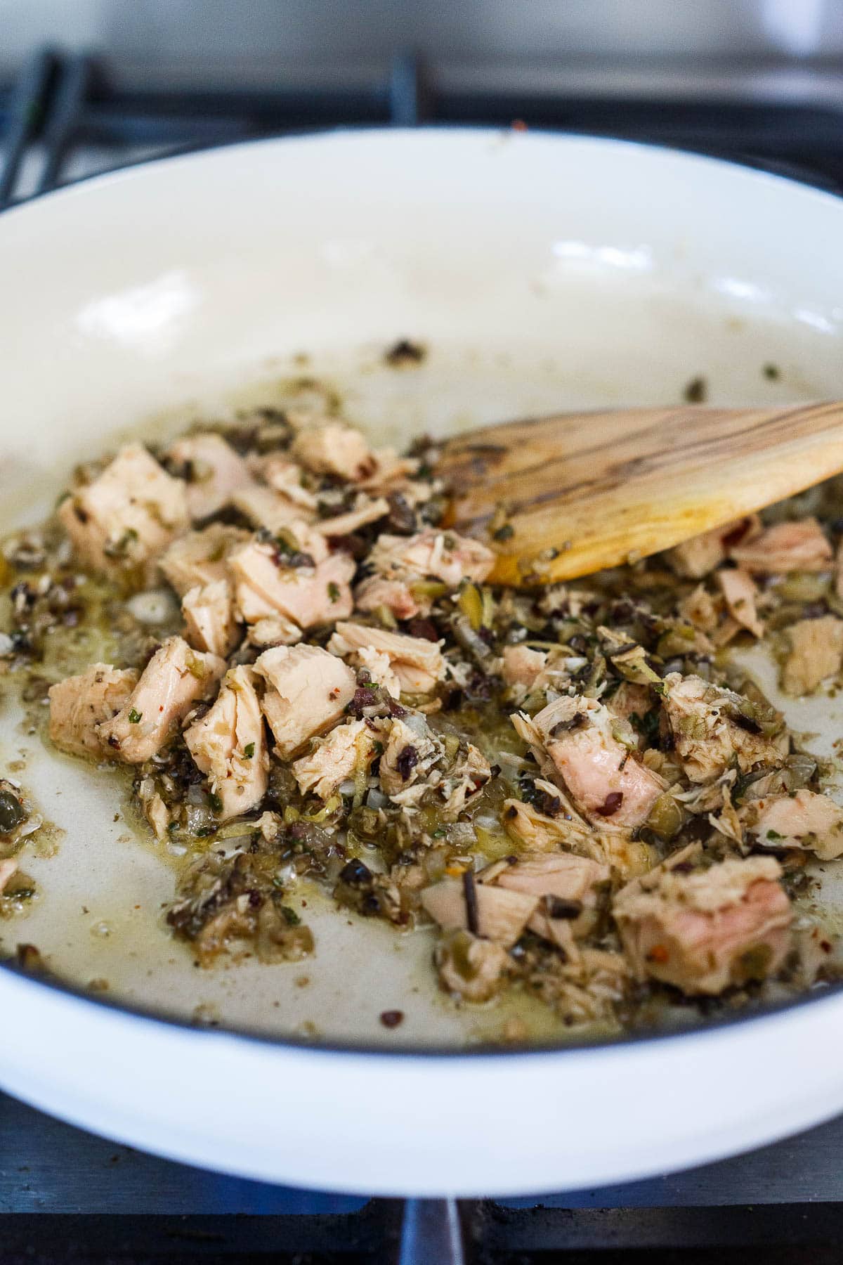 sautéing tuna, olive tapenade, lemon zest with garlic