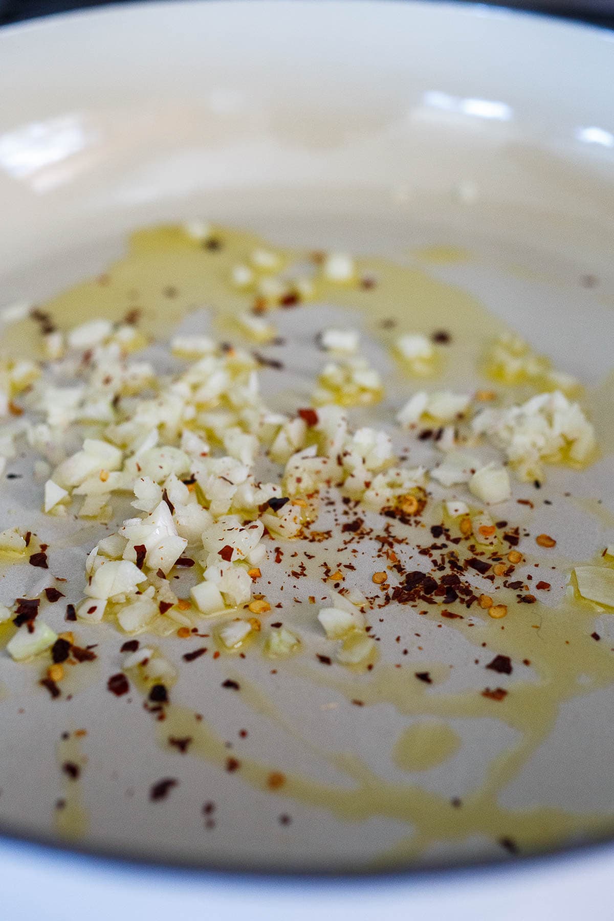 sautéing garlic in olive oil and red pepper flakes