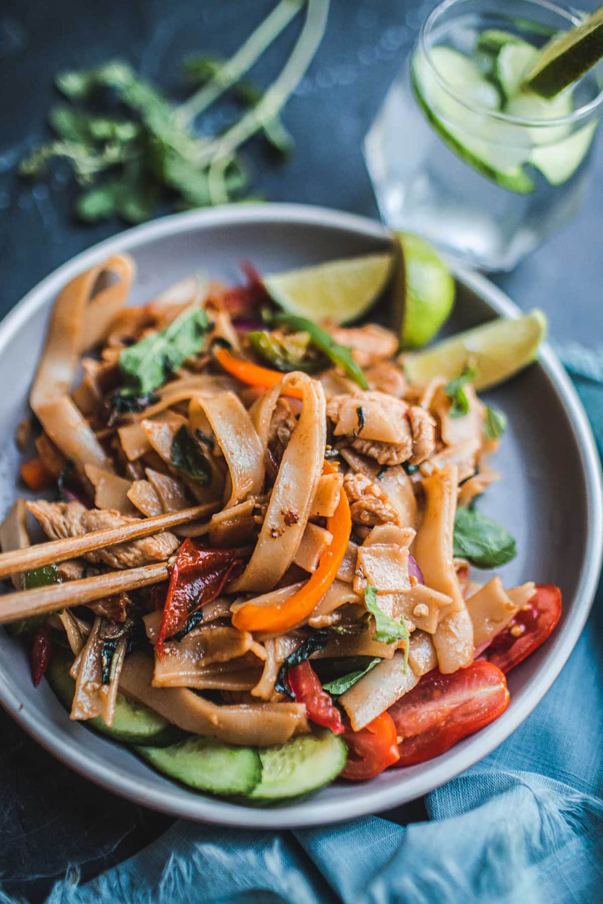 Thai Drunken Noodles are not only the perfect hangover cure, but these saucy stir-fried rice noodles are a fast, easy, 30-minute weeknight dinner! Full of umami flavor, make it with chicken, shrimp or crispy tofu! 