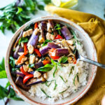 This Thai Eggplant Stir Fry is a delicious healthy meal featuring succulent eggplant, your choice of protein, fresh veggies in a flavorful Thai stir-fry sauce, finished with aromatic Thai basil.