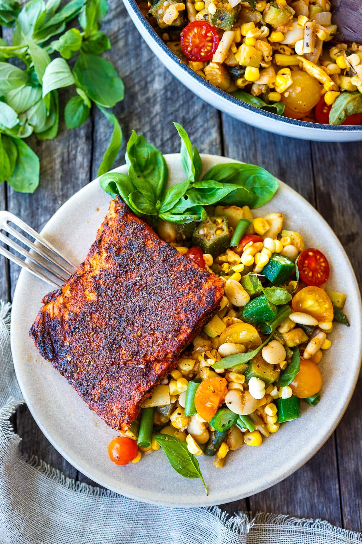 Harvest Succotash is abundant with fresh summer veggies and simple, clean flavors.  Makes an healthy delicious side dish for almost any meal and is great for potlucks!  Adapt this recipe to what you have on hand and top with protein for a healthy delicious meal!  