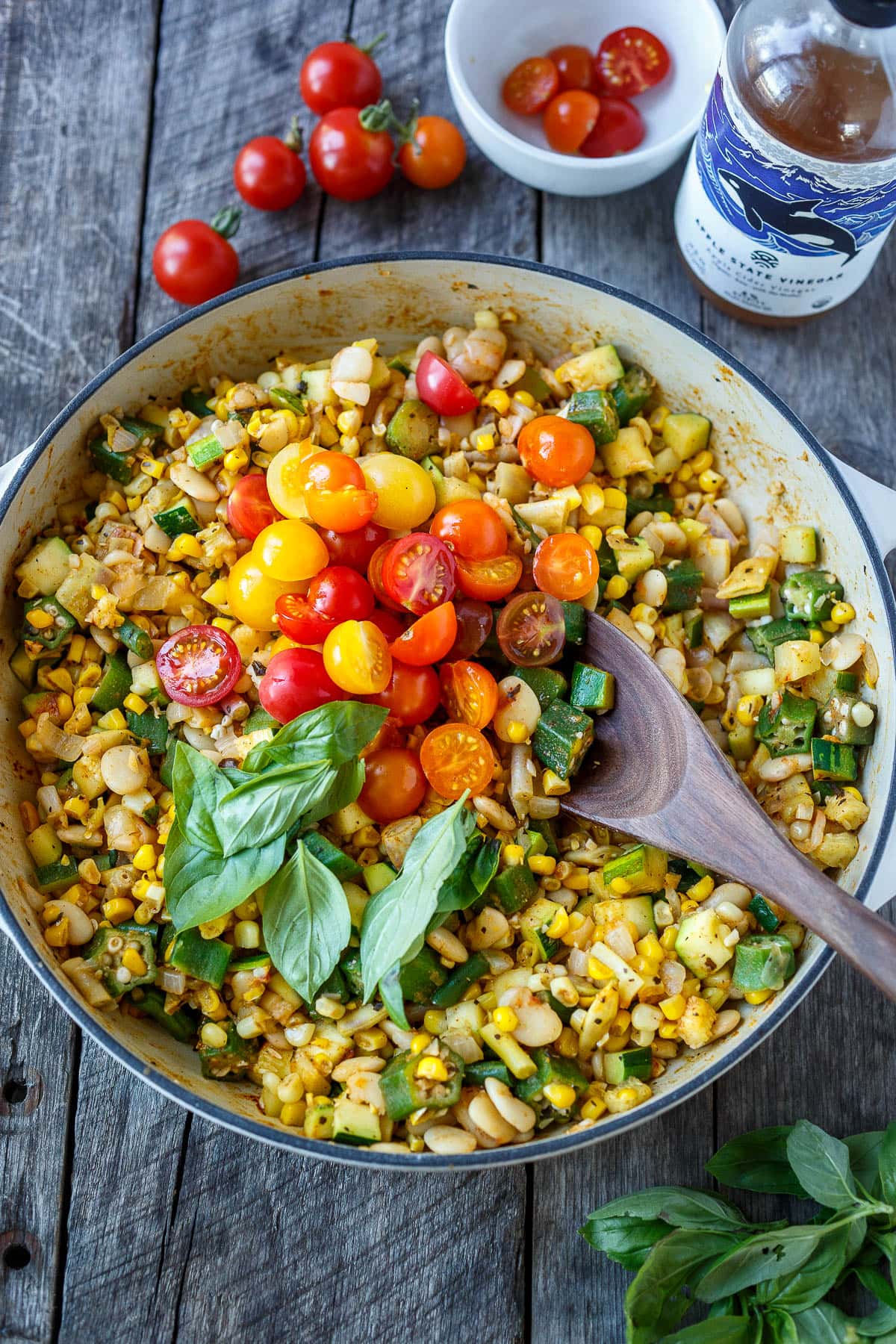 Adding fresh tomatoes and basil to finish.