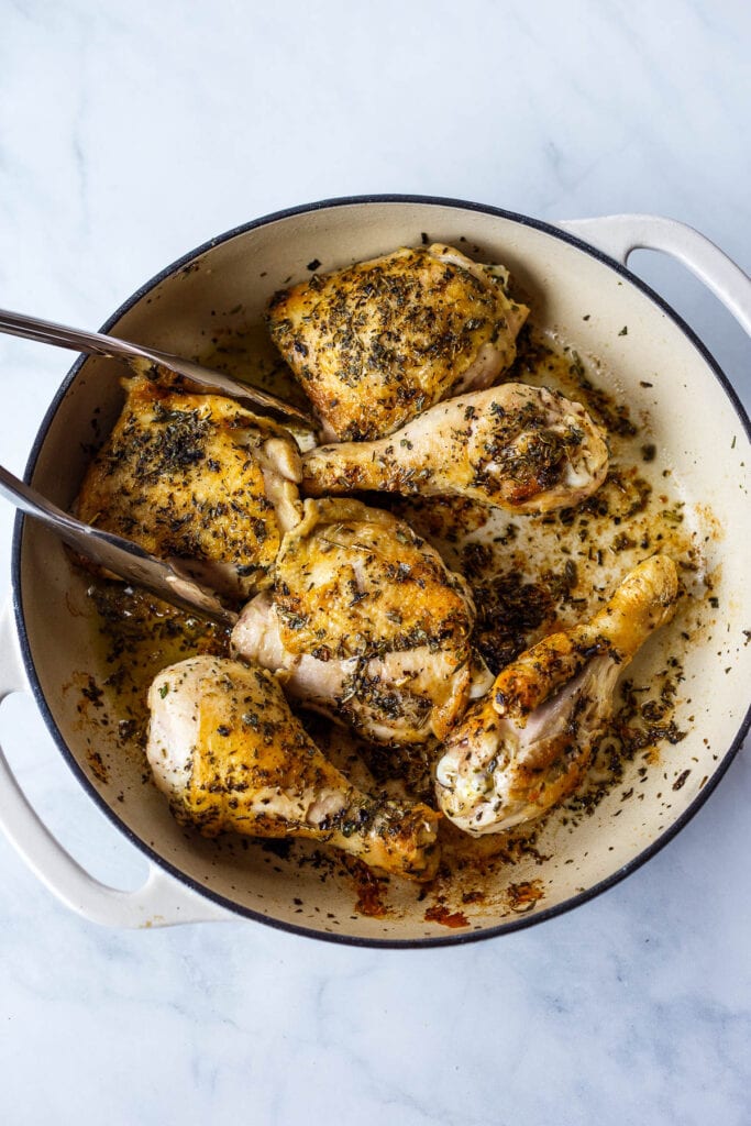 Pan seared chicken thighs and legs in a brasier with herbs de Provence.