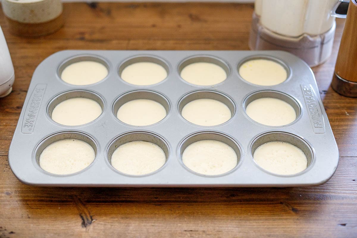 divide batter into a greased muffin tin. 