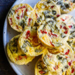 Quick and easy Egg Bites with roasted peppers and basil are the perfect make-ahead breakfast, ready in 35 minutes. Keto, Vegetarian.