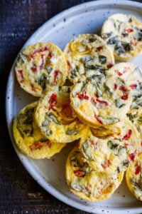 Quick and easy Egg Bites with roasted peppers and basil are the perfect make-ahead breakfast, ready in 35 minutes. Keto, Vegetarian.