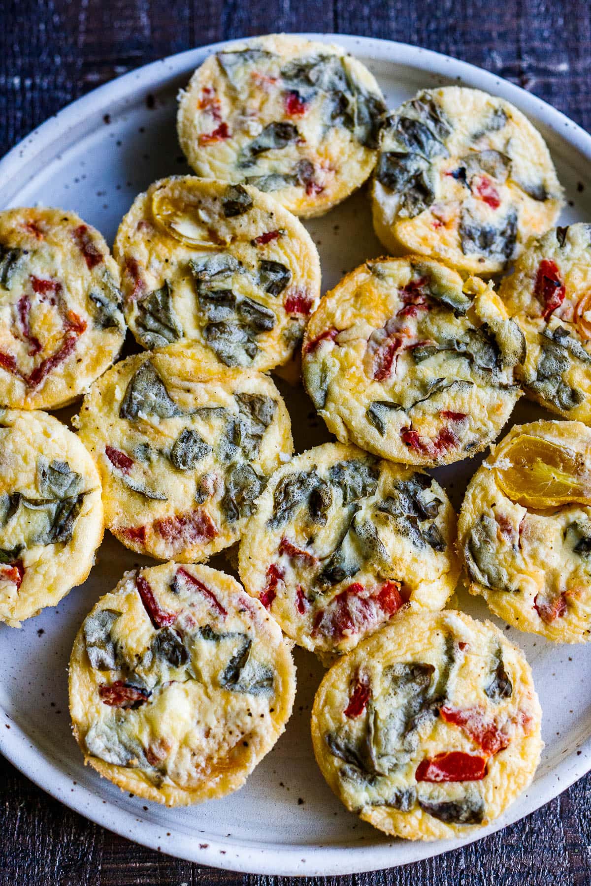 Quick and easy Egg Bites with roasted peppers and basil are the perfect make-ahead breakfast, ready in 35 minutes. Keto, Vegetarian.