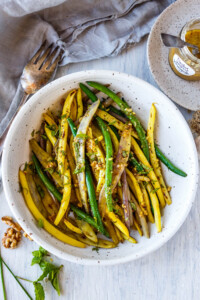 Green beans with Toasted Walnut Vinaigrette, a simple, delicious side dish that will enhance almost any meal. Vegan and Gluten-free. 