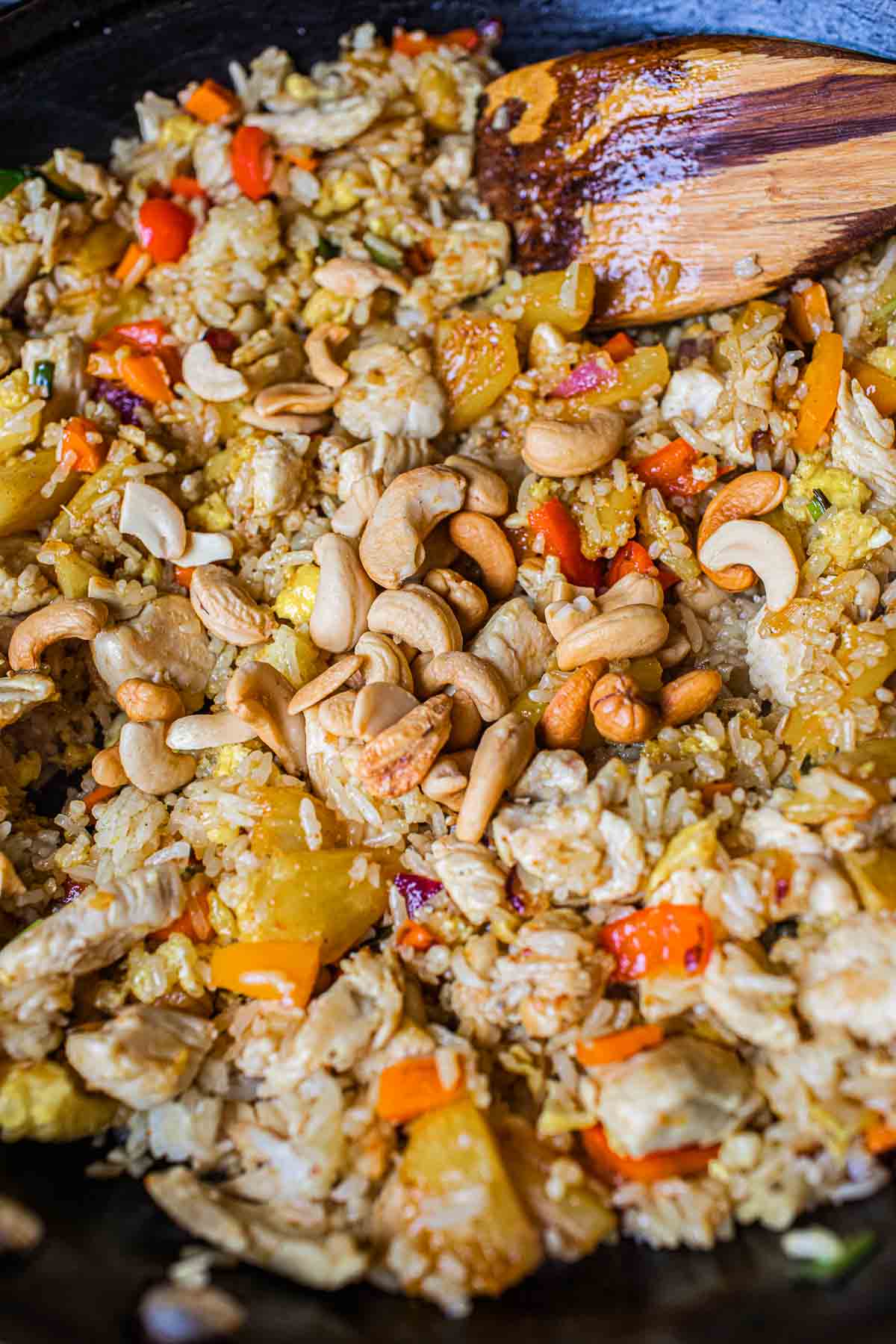 pineapple fried rice with cashew in a wok