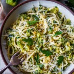 Here's a quick and simple recipe for Easy Zucchini Pasta. Grated zucchini melts into a flavorful succulent sauce, perfect for cradling linguini or your favorite pasta! Enhanced with lemon, black pepper and garlic you'll have dinner on the table in 30 minutes! Vegan and gluten-free adaptable.