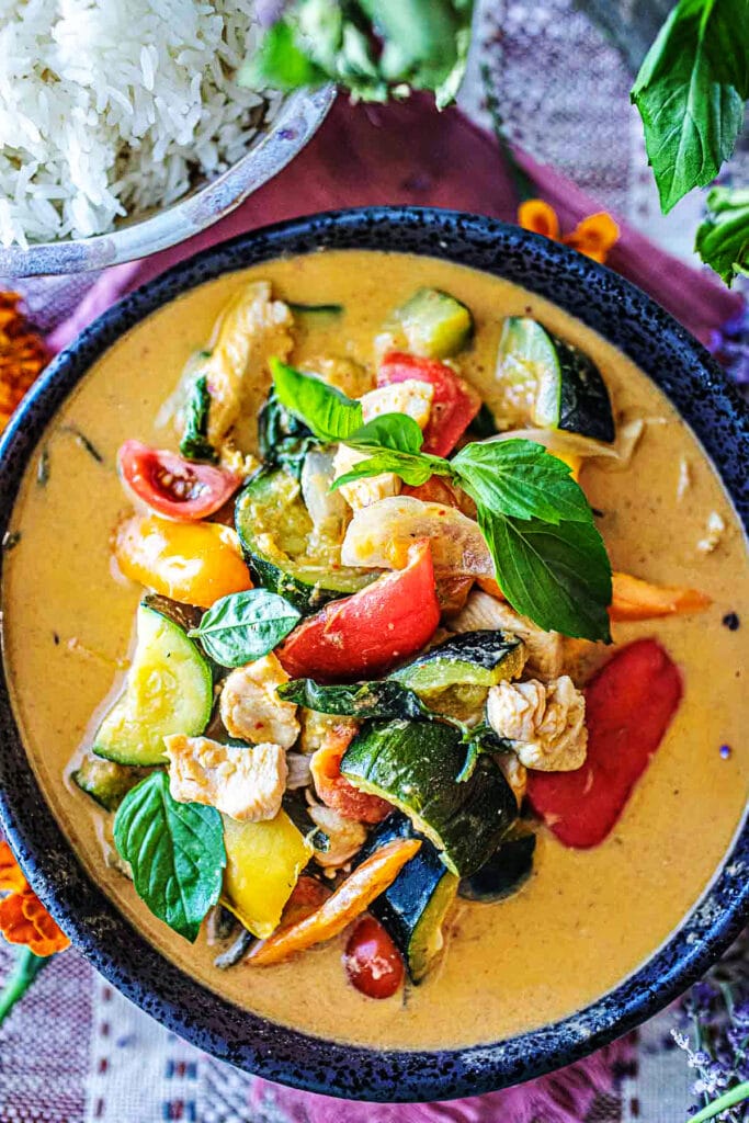 Vegetable Red Curry is a delightful dish made with Thai red curry paste, coconut milk and chicken or tofu. A healthy, flavorful 30-minute dinner.