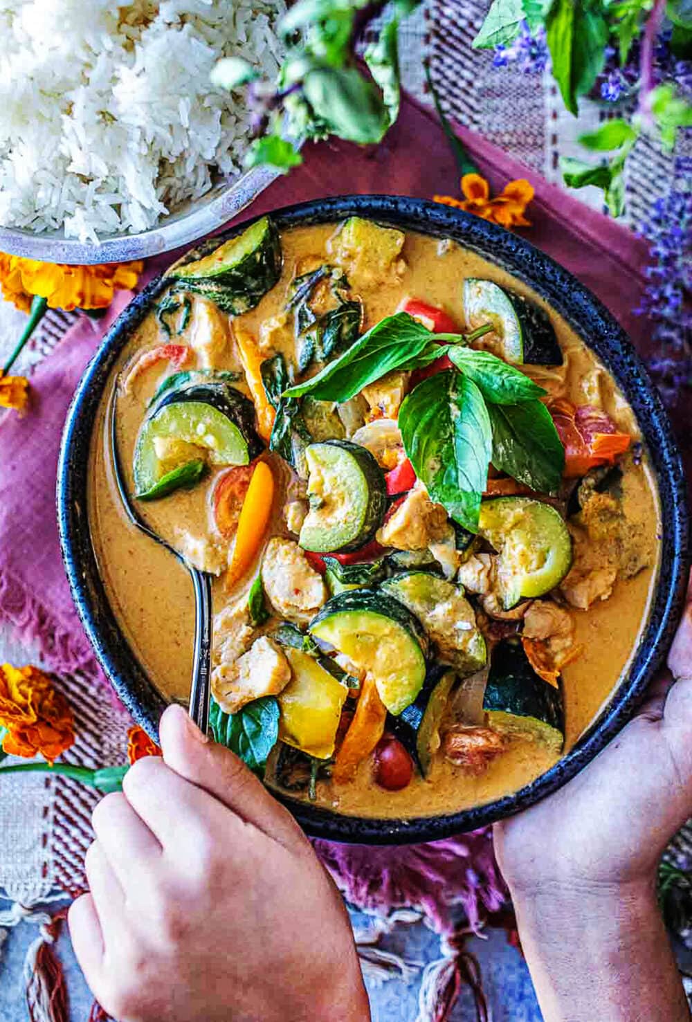 Zucchini Curry is a delightful dish made with Thai red curry paste, coconut milk and chicken or tofu. A healthy, flavorful 30-minute dinner.